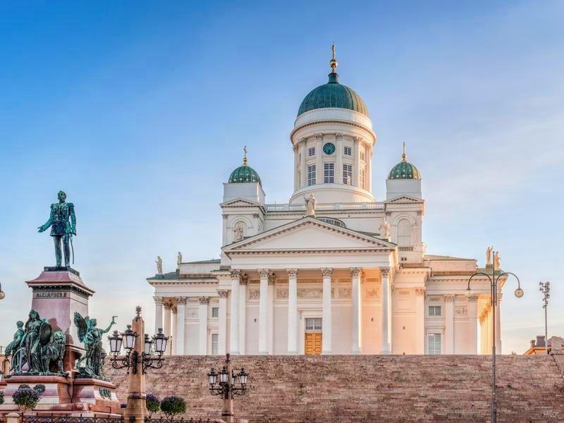 Helsinki Cathedral above the steps of Senate Square, the Alexander II statue at the left