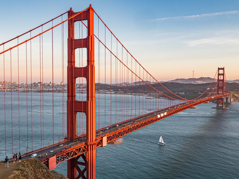 The Golden Gate Bridge at sunset, looking across the bay towards San Francisco