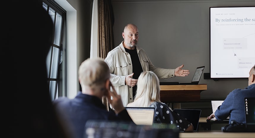 A speaker presenting to an audience